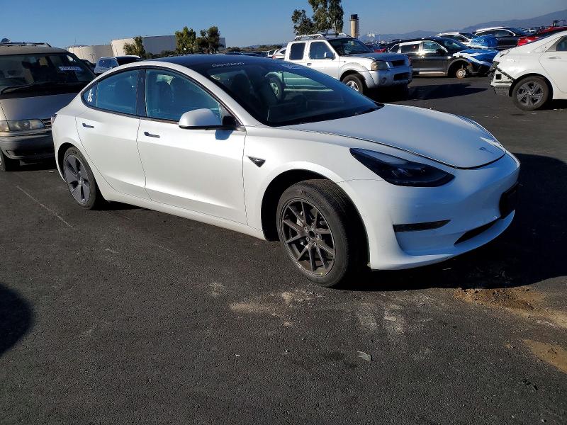 Photo 4 from auction – 2022 TESLA MODEL 3 with VIN 5YJ3E1EA3NF354450