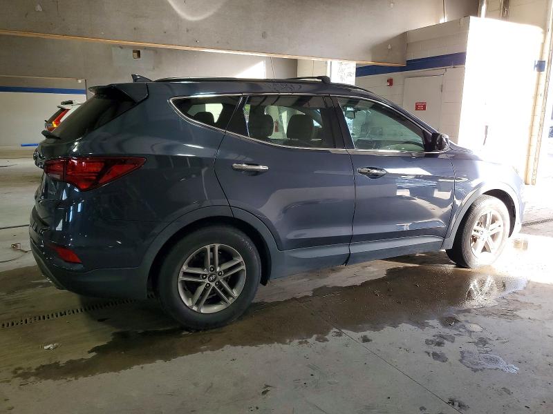 Photo 3 from auction – 2018 HYUNDAI SANTA FE S with VIN 5NMZU3LB4JH094878