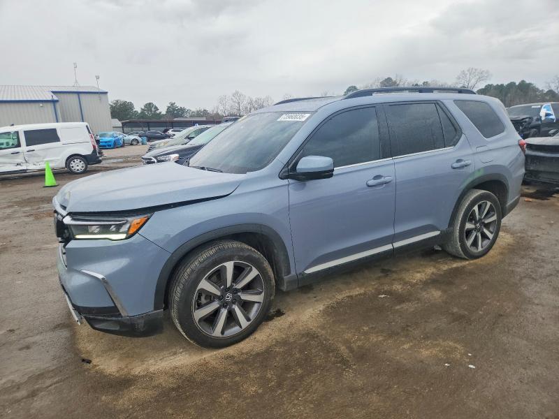 Photo 1 from auction – 2024 HONDA PILOT TOUR with VIN 5FNYG1H7XRB030532