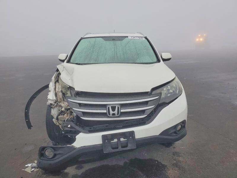 Photo 5 from auction – 2014 HONDA CR-V EXL with VIN 5J6RM4H71EL028216