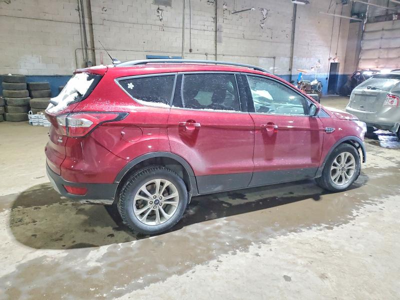 Photo 3 from auction – 2018 FORD ESCAPE SE with VIN 1FMCU0GD5JUC46896