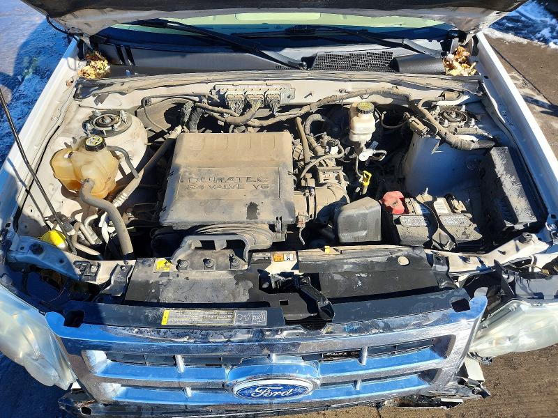 Photo 12 from auction – 2011 FORD ESCAPE LIM with VIN 1FMCU9EG9BKA38373