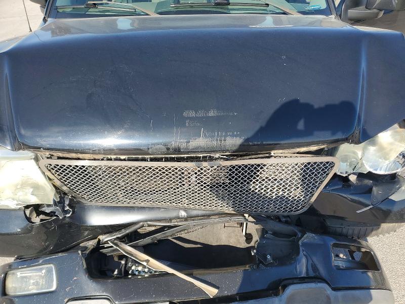 Photo 11 from auction – 2004 FORD F150 with VIN 1FTRX12W64NB93256