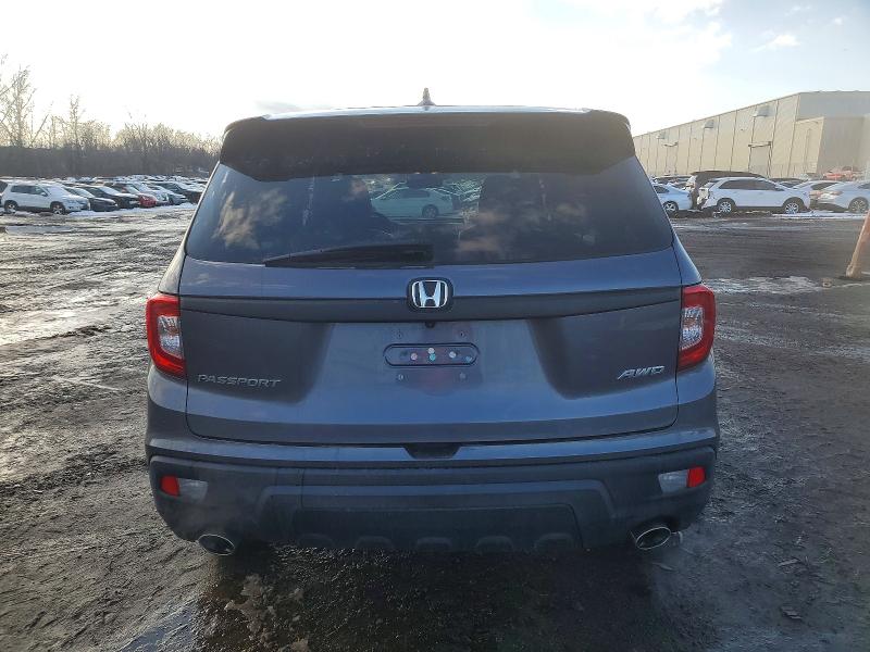 Photo 6 from auction – 2021 HONDA PASSPORT E with VIN 5FNYF8H57MB013917