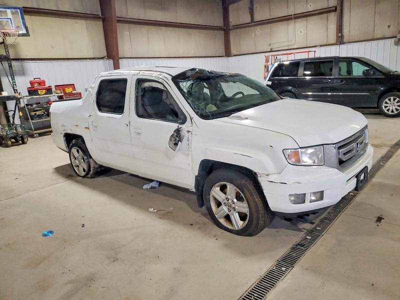 Photo 4 from auction – 2011 HONDA RIDGELINE with VIN 5FPYK1F57BB007075