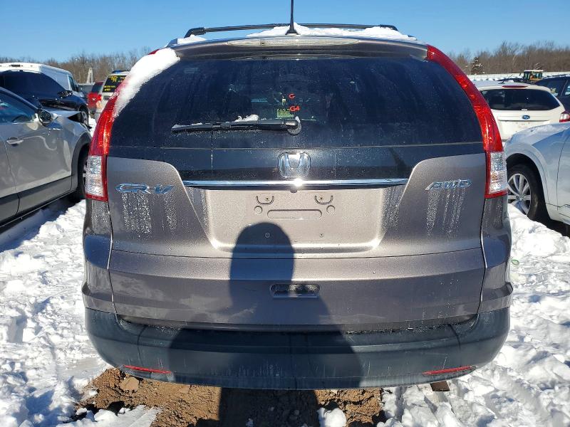 Photo 6 from auction – 2012 HONDA CR-V with VIN 5J6RM4H76CL028029