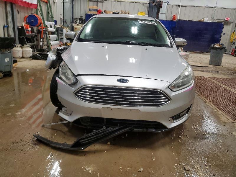Photo 5 from auction – 2015 FORD FOCUS with VIN 1FADP3N27FL324150