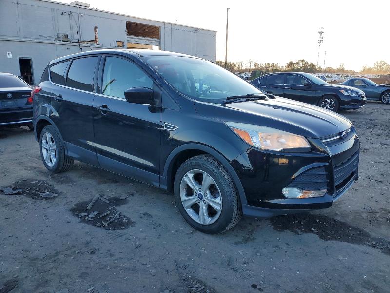Photo 4 from auction – 2016 FORD ESCAPE with VIN 1FMCU9G9XGUA69318