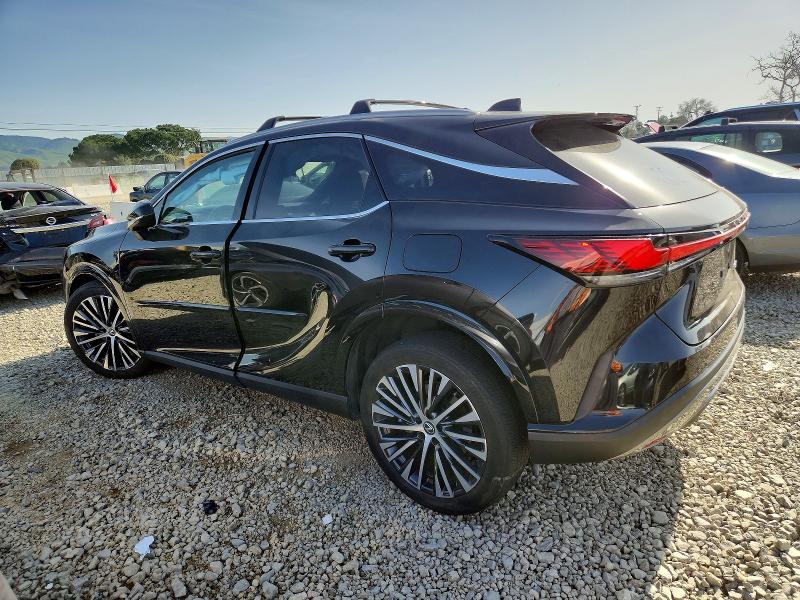 Photo 2 from auction – 2023 LEXUS RX with VIN JTJCHMAA3P2003653