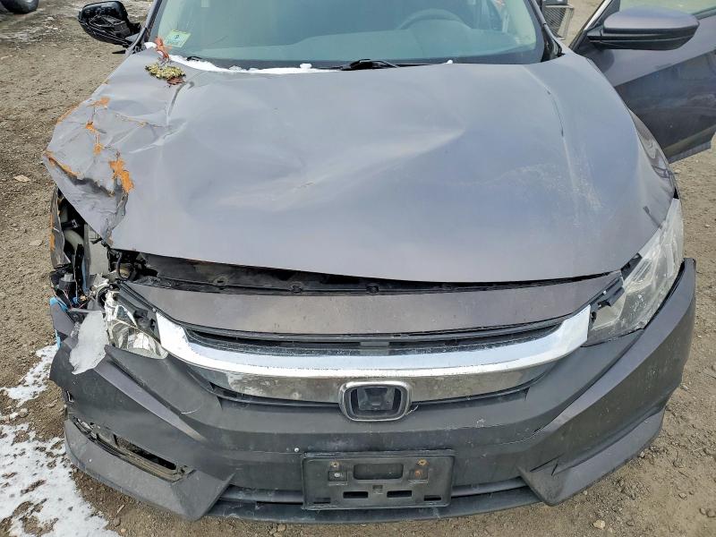 Photo 11 from auction – 2017 HONDA CIVIC LX with VIN 19XFC2F59HE208770