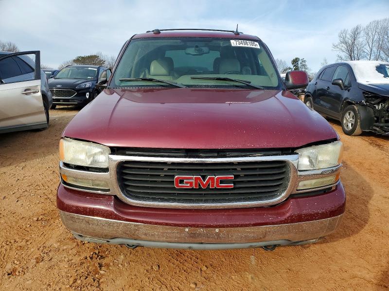 Photo 5 from auction – 2004 GMC YUKON with VIN 1GKEC13ZX4R300454