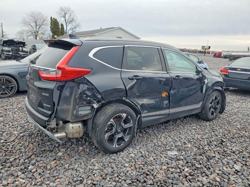Photo 3 from auction – 2017 HONDA CR-V TOURI with VIN 5J6RW2H96HL060812