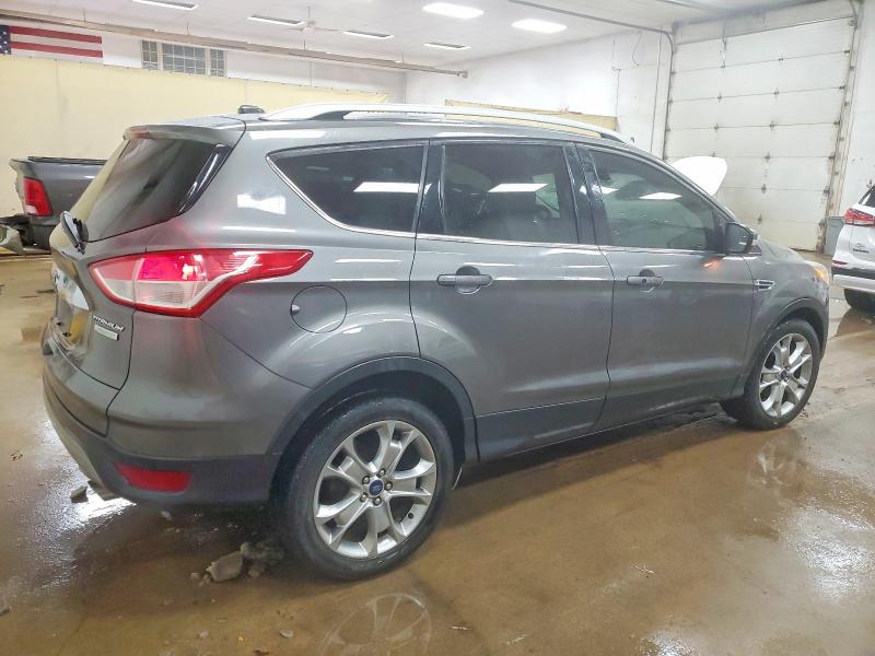 Photo 3 from auction – 2014 FORD ESCAPE TIT with VIN 1FMCU0JXXEUD84412