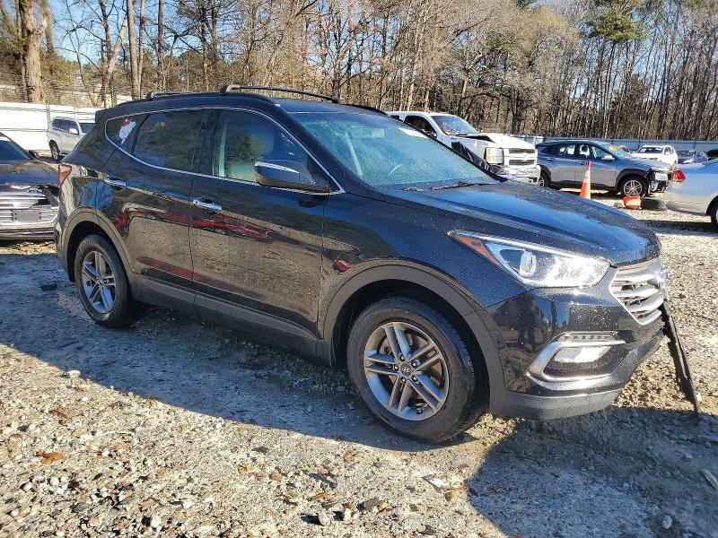 Photo 4 from auction – 2017 HYUNDAI SANTA FE S with VIN 5NMZU3LB6HH014460