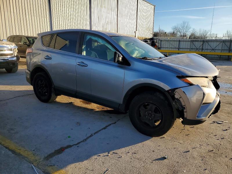 Photo 4 from auction – 2018 TOYOTA RAV4 LE with VIN 2T3ZFREV8JW450250