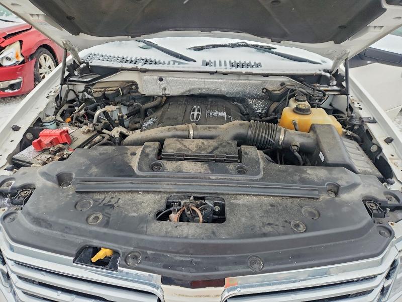 Photo 12 from auction – 2015 LINCOLN NAVIGATOR with VIN 5LMJJ2JT6FEJ06379