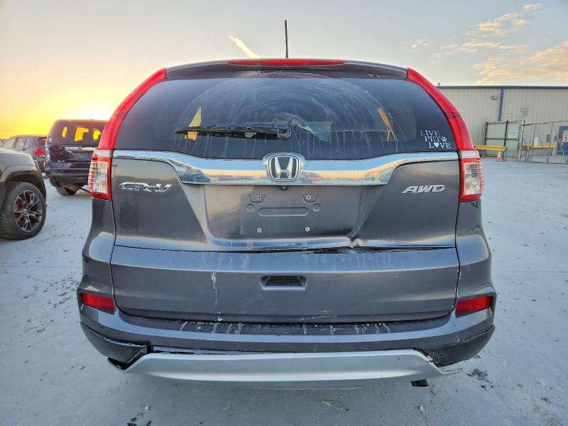 Photo 6 from auction – 2016 HONDA CR-V EX with VIN 2HKRM4H56GH629293