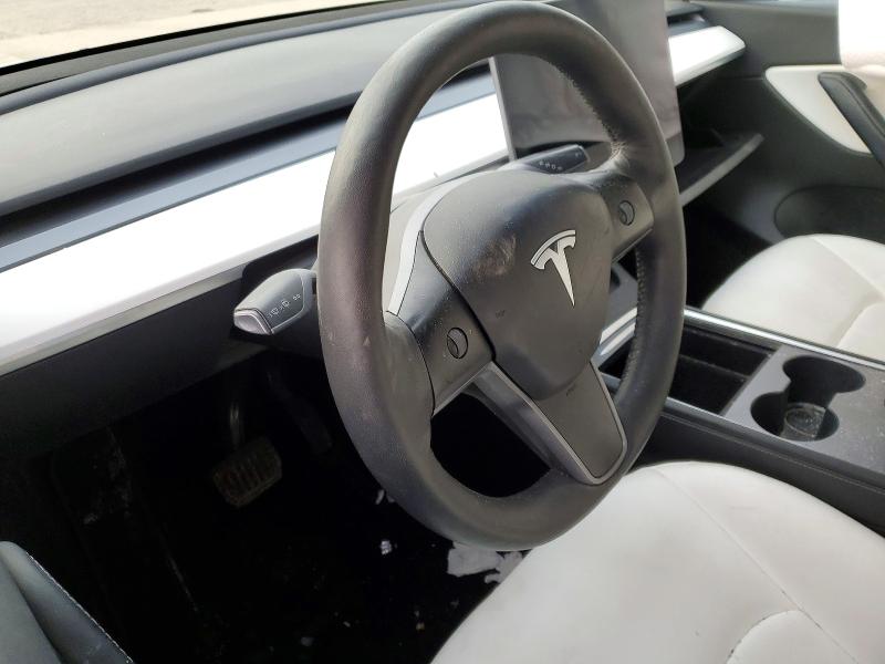 Photo 9 from auction – 2022 TESLA MODEL Y with VIN 7SAYGDEE0NF310378