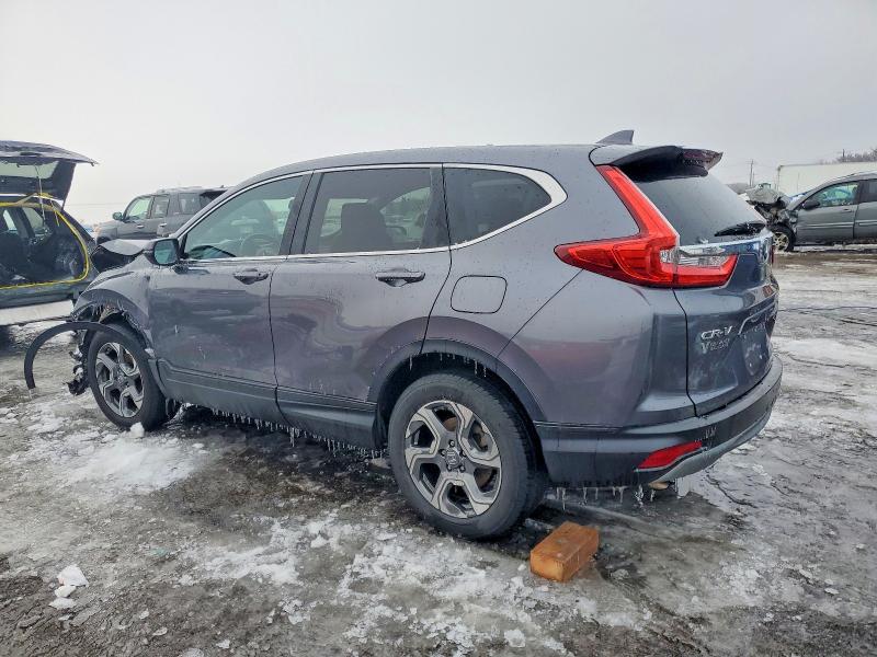 Photo 2 from auction – 2017 HONDA CR-V with VIN 5J6RW2H81HL023643