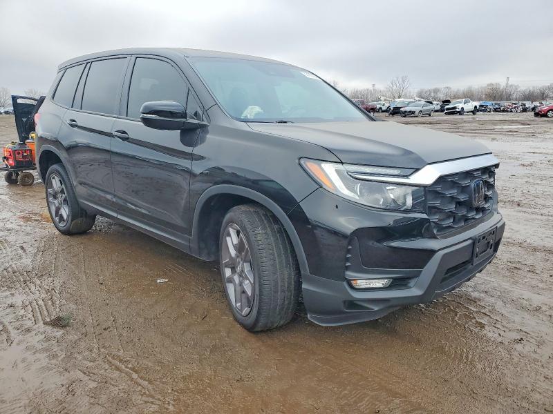 Photo 4 from auction – 2022 HONDA PASSPORT with VIN 5FNYF8H59NB030462