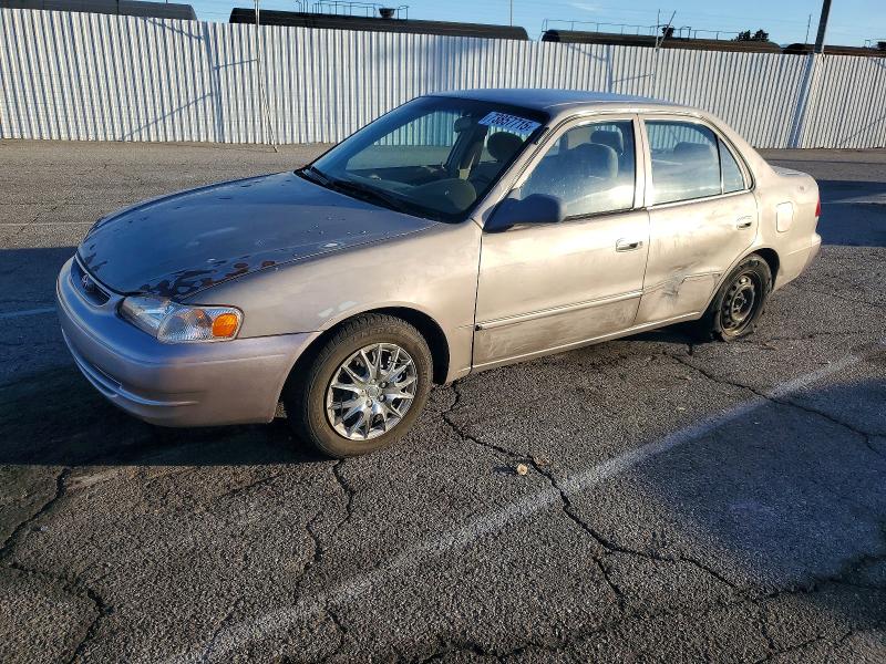 TOYOTA COROLLA 2000 with VIN 1NXBR12E7YZ405172 - Photo from auction
