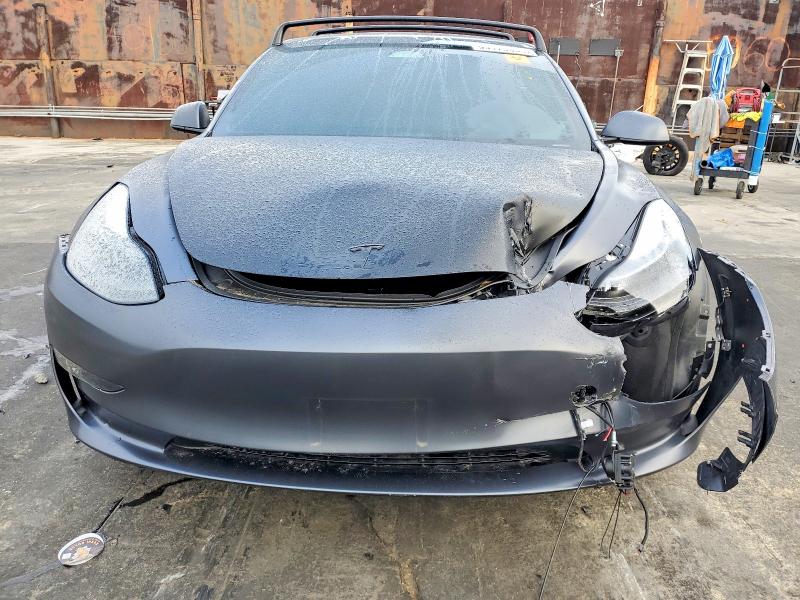 Photo 5 from auction – 2023 TESLA MODEL 3 with VIN 5YJ3E1EC1PF509985