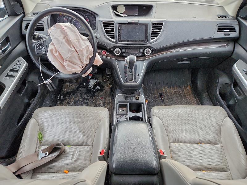 Photo 8 from auction – 2015 HONDA CR-V EXL with VIN 2HKRM4H77FH638486