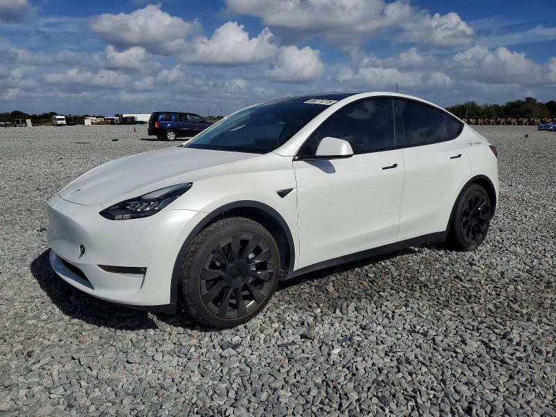 TESLA MODEL Y 2023 with VIN 7SAYGDEEXPF611307 - Photo from auction