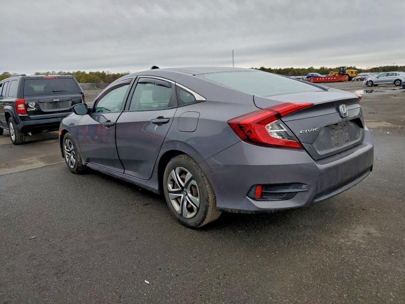 Photo 2 from auction – 2018 HONDA CIVIC LX with VIN 2HGFC2F51JH569079