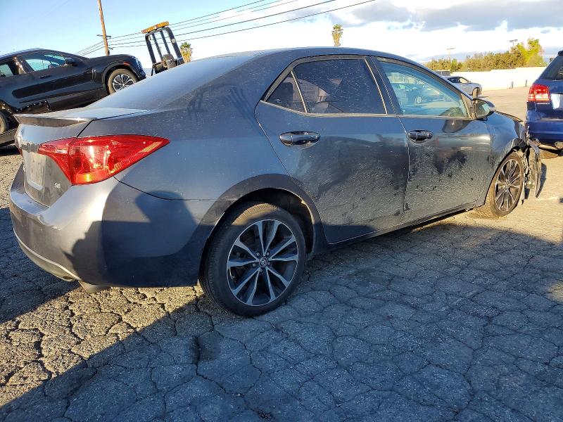Photo 3 from auction – 2017 TOYOTA COROLLA L with VIN 5YFBURHE9HP610515