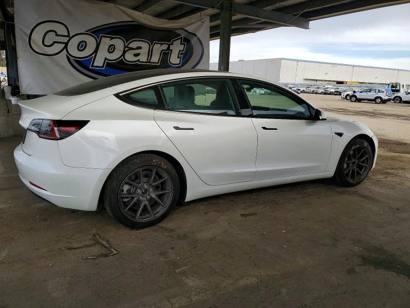 Photo 3 from auction – 2021 TESLA MODEL 3 with VIN 5YJ3E1EA8MF073212