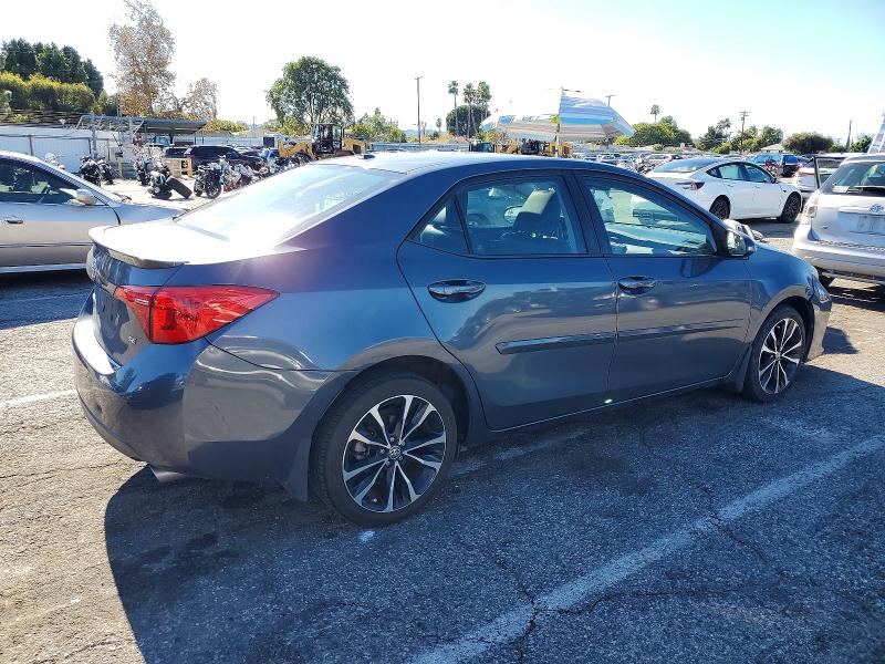Photo 3 from auction – 2017 TOYOTA COROLLA L with VIN 5YFBURHE4HP586883