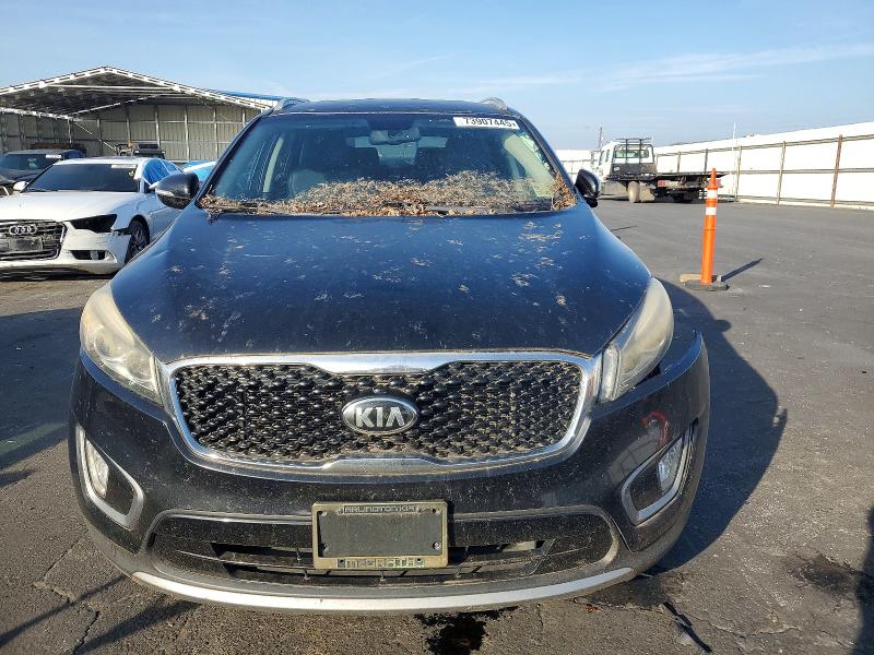 Photo 5 from auction – 2016 KIA SORENTO EX with VIN 5XYPH4A50GG041029