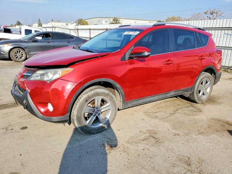 TOYOTA RAV4 2015 with VIN 2T3WFREV9FW142899 - Photo from auction
