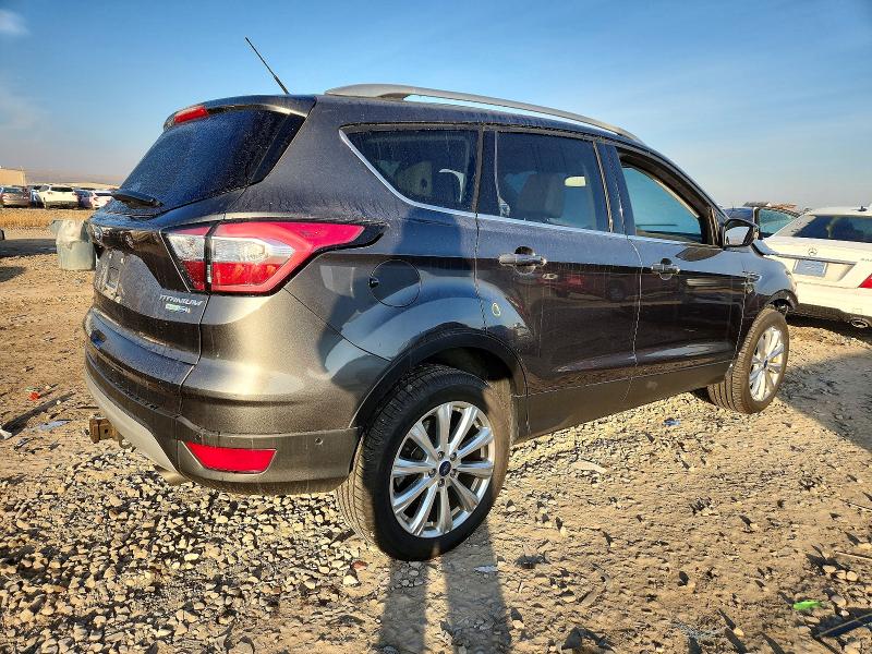 Photo 3 from auction – 2017 FORD ESCAPE TIT with VIN 1FMCU9J99HUC50291