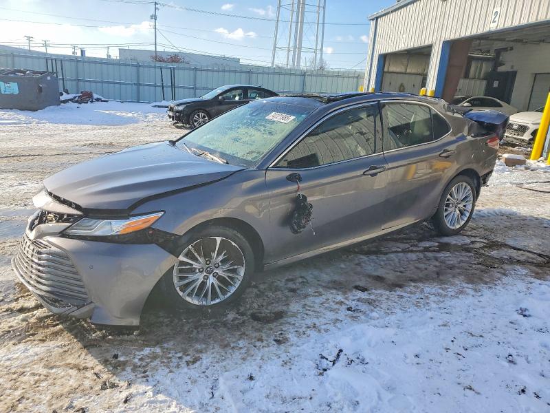 TOYOTA CAMRY L 2018 with VIN 4T1B11HK3JU040502 - Photo from auction