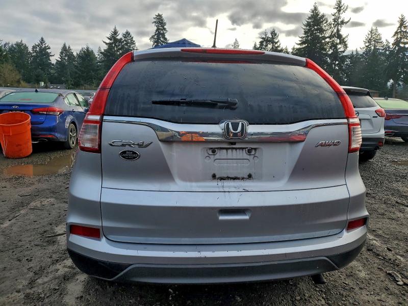 Photo 6 from auction – 2016 HONDA CR-V LX with VIN 2HKRM4H37GH633688