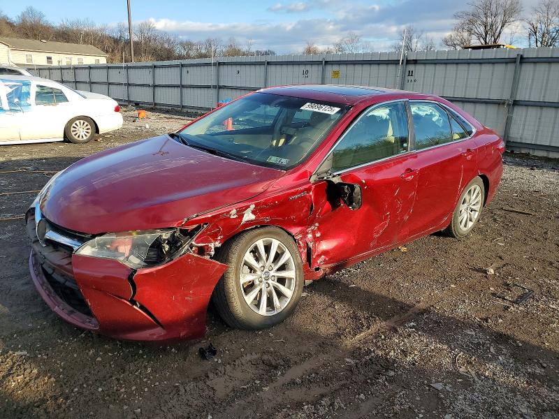 TOYOTA CAMRY HYBR 2016 with VIN 4T1BD1FK2GU189017 - Photo from auction