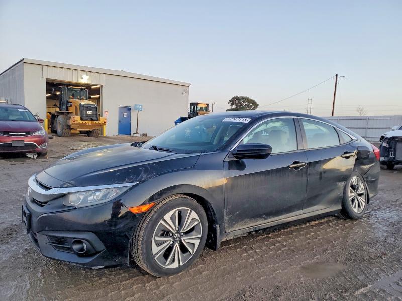 HONDA CIVIC EXL 2016 with VIN 19XFC1F71GE001803 - Photo from auction