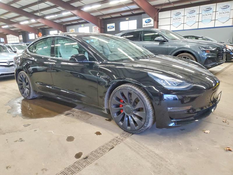 Photo 4 from auction – 2021 TESLA MODEL 3 with VIN 5YJ3E1EC0MF856347