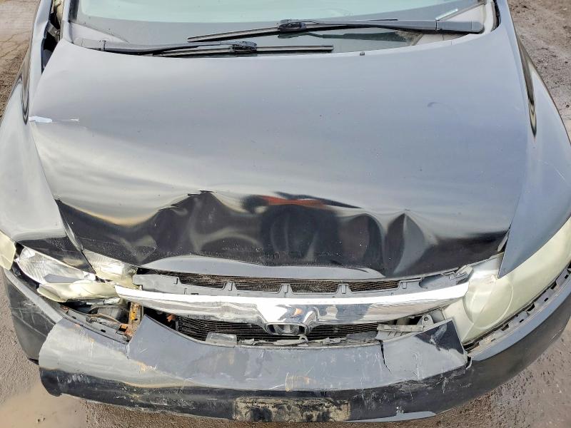 Photo 11 from auction – 2009 HONDA CIVIC with VIN 2HGFA16509H542094