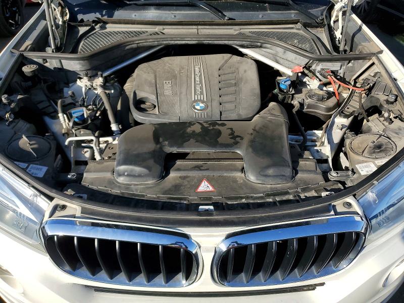 Photo 11 from auction – 2015 BMW X5 XDRIVE3 with VIN 5UXKS4C57F0N07034