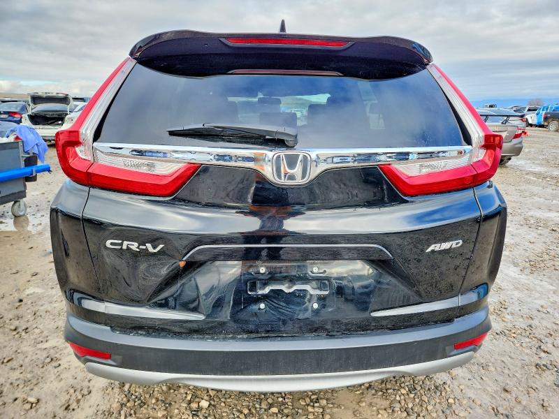 Photo 6 from auction – 2018 HONDA CR-V EX with VIN 7FARW2H58JE030615
