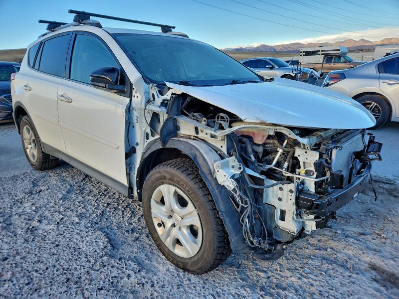 Photo 4 from auction – 2014 TOYOTA RAV4 LE with VIN JTMBFREV0EJ006799