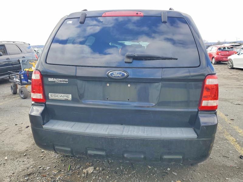 Photo 6 from auction – 2009 FORD ESCAPE with VIN 1FMCU03G19KA58044