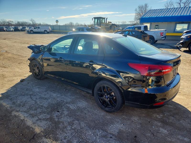 Photo 2 from auction – 2016 FORD FOCUS with VIN 1FADP3F24GL357090