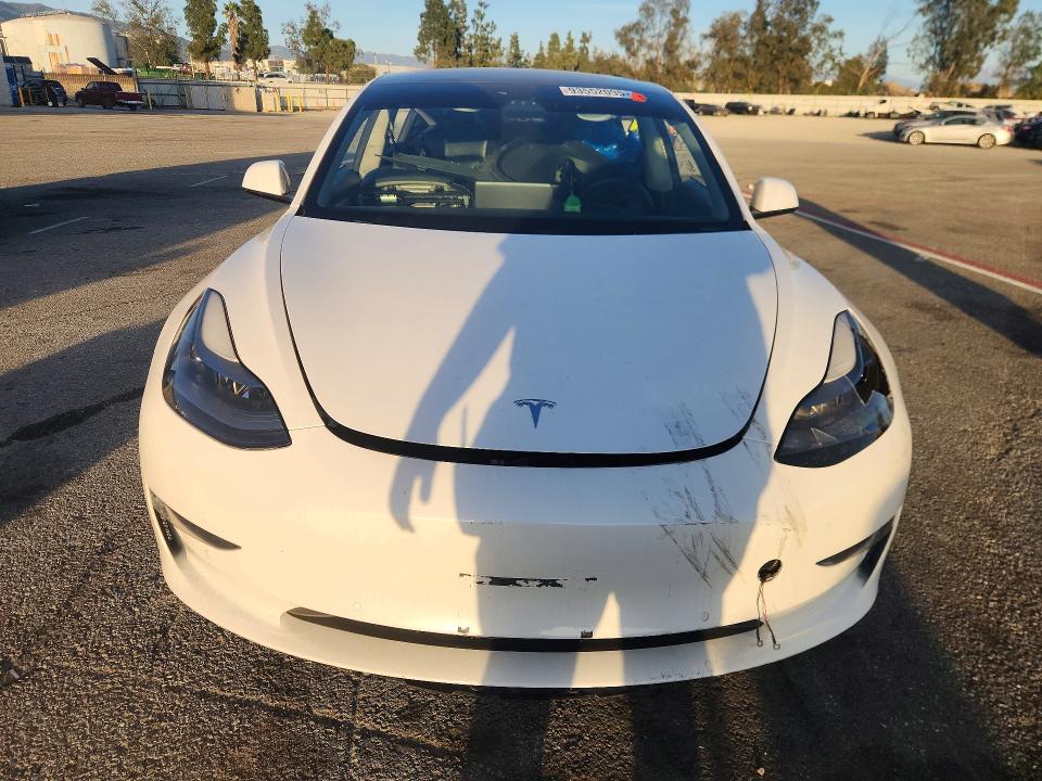 Photo 5 from auction – 2021 TESLA MODEL 3 with VIN 5YJ3E1EA9MF982690