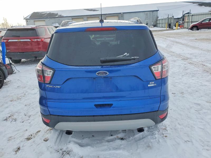 Photo 6 from auction – 2017 FORD ESCAPE with VIN 1FMCU9GDXHUE91451