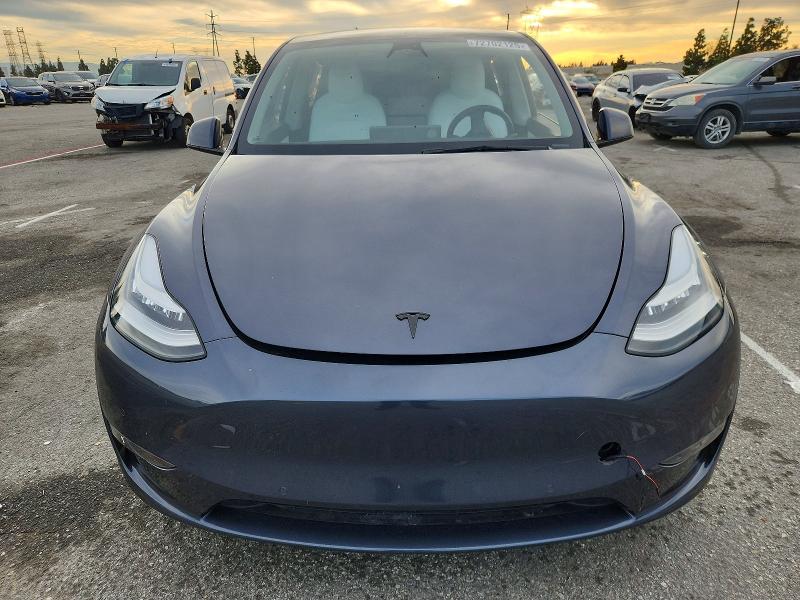 Photo 5 from auction – 2022 TESLA MODEL Y with VIN 7SAYGDEE2NF339641