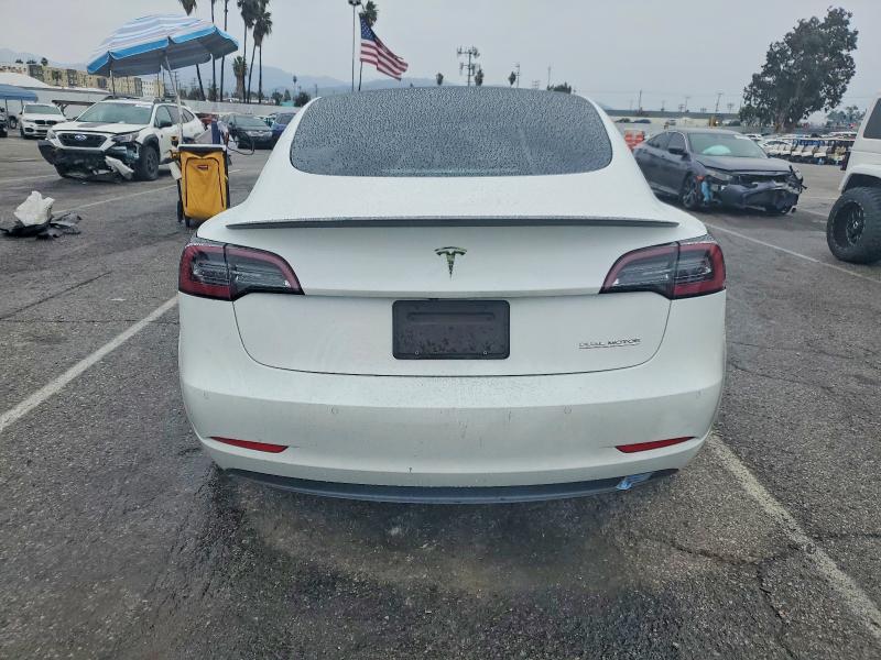Photo 6 from auction – 2021 TESLA MODEL 3 with VIN 5YJ3E1EC4MF935939